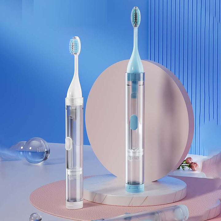 Miniature travel toothbrush with cover and paste compartment, great for camping trips