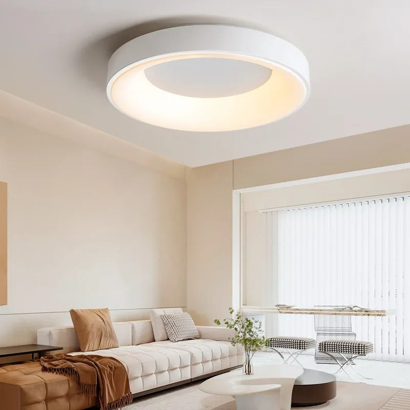Contemporary circular metal LED ceiling light, sleek design with acrylic finish, emits soft warm or cool lighting for home de