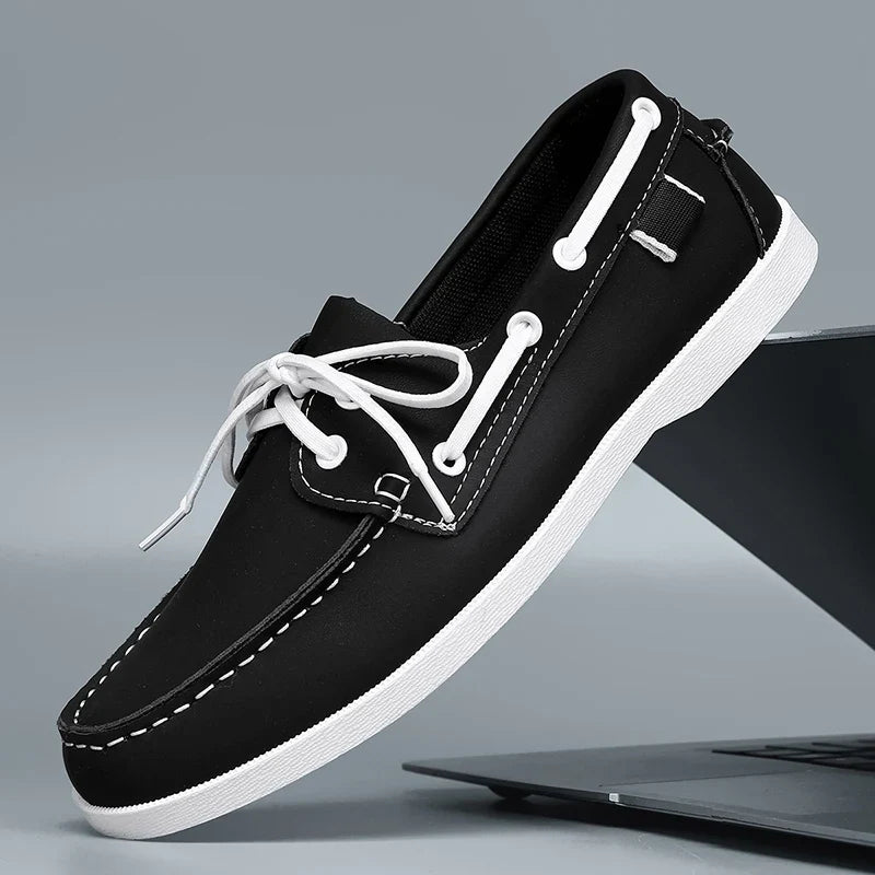 Corvan men's vegan leather deck loafers arranged artfully, highlighting their classic and timeless design.