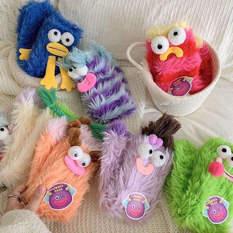 Soft women's cozy monster socks, playful cartoon aesthetic, comfortable and warm.
