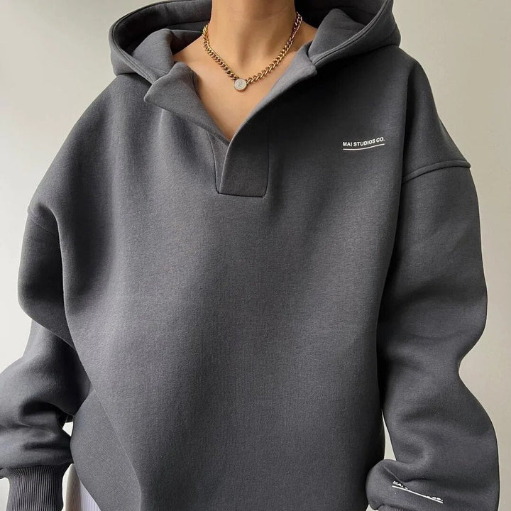 Comfortable women's hooded sweatshirt, perfect for everyday wear. Soft, warm winter pullover.