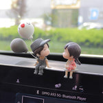 gray couple with balloon