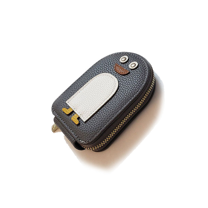Stylish PU leather wallet depicting a cute penguin, ideal for women's cards & coins.
