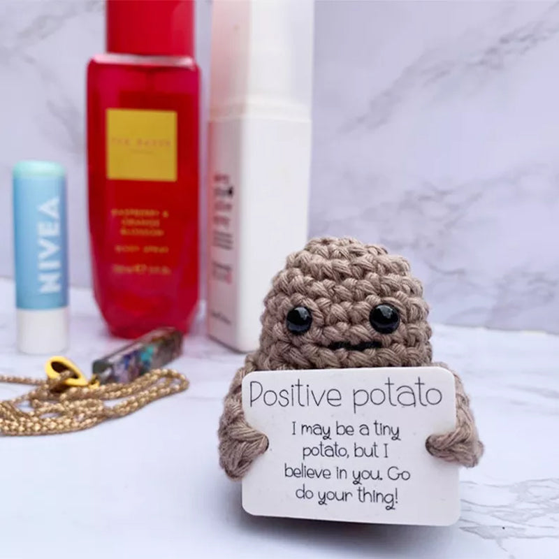 Handmade positive potato knitted doll smiling, a funny motivational Christmas gift for anyone.
