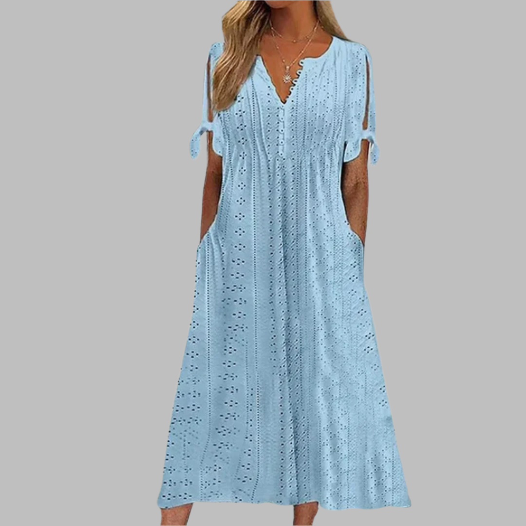 Comfortable Women's Boho Midi Summer Dress with practical pockets. Delicate, A-line, and perfect for vacation outfits.