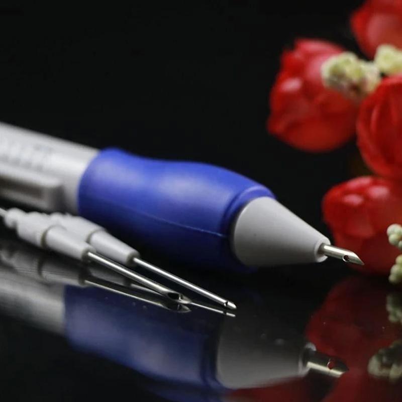 Embroidery hoop holding fabric with a beginner-friendly punch needle in action, crafting a floral design