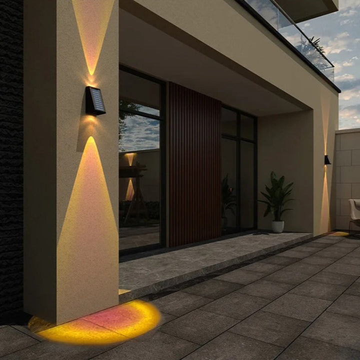 "Eco-friendly solar wall light with up and down illumination, modern aluminum and glass design, for outdoor decor."