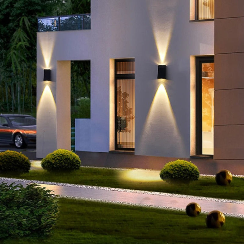 "Eco-friendly solar wall light with up and down illumination, modern aluminum and glass design, for outdoor decor."