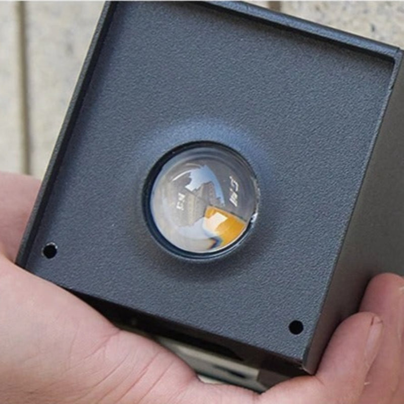 "Eco-friendly solar wall light with up and down illumination, modern aluminum and glass design, for outdoor decor."