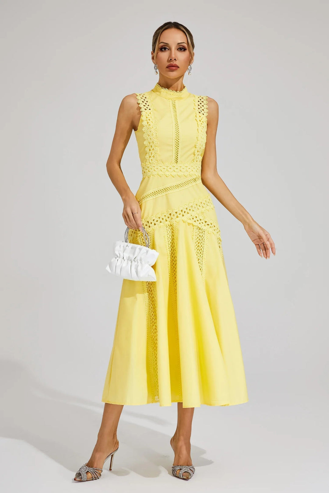 Blue sleeveless lace A-line midi dress with mock neck, chic formal wear for women.