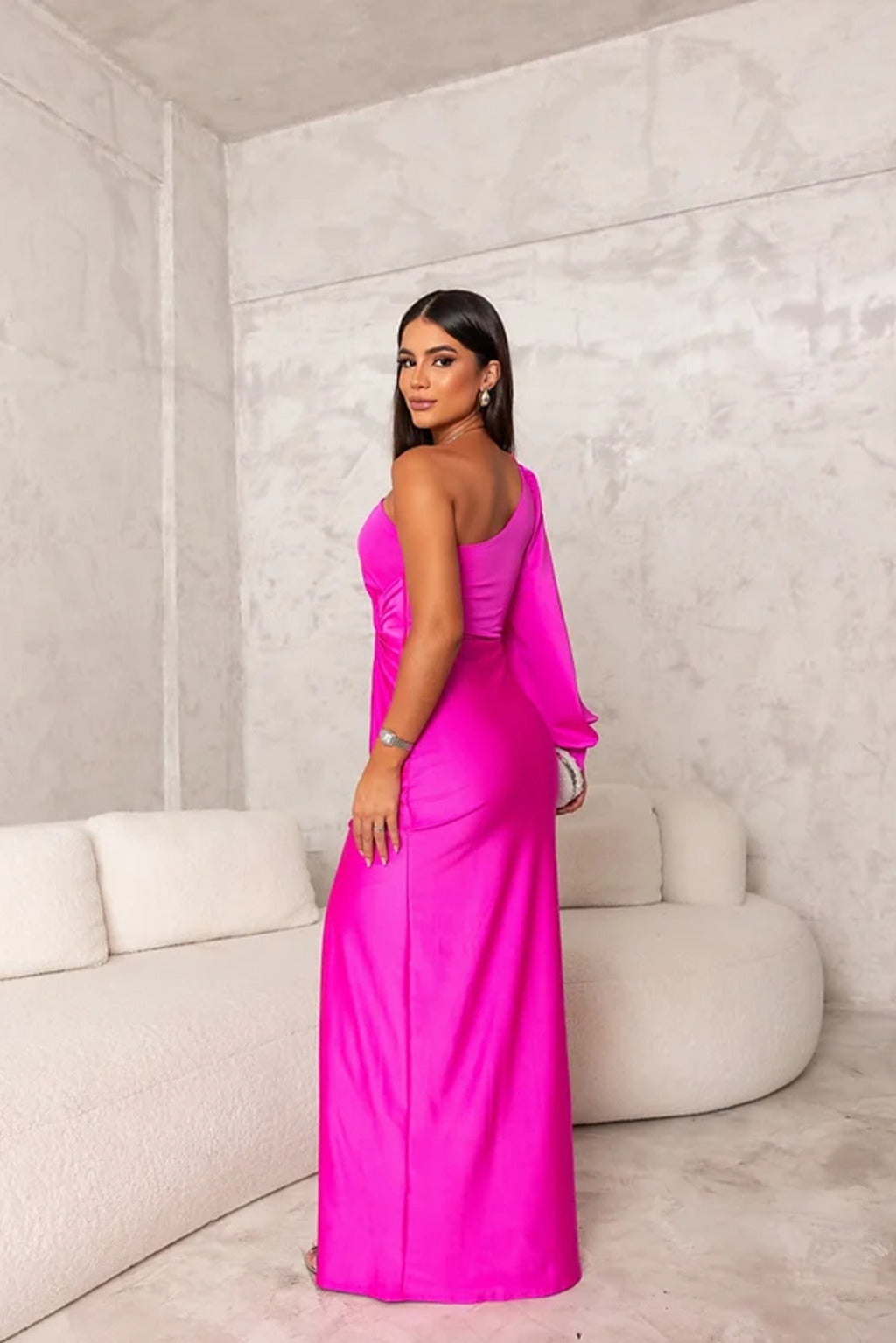 Stylish one-shoulder ruched prom dress, elegant maxi length with a subtle split.