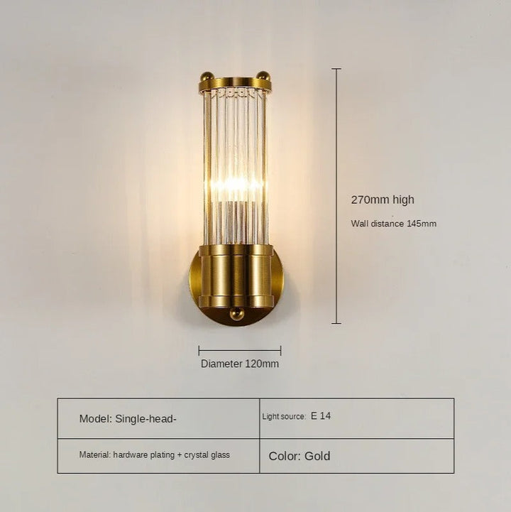 "Elegant cylindrical glass wall light in gold or chrome with modern design, ideal for enhancing any room's ambiance."