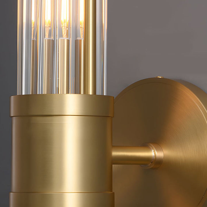 "Elegant cylindrical glass wall light in gold or chrome with modern design, ideal for enhancing any room's ambiance."