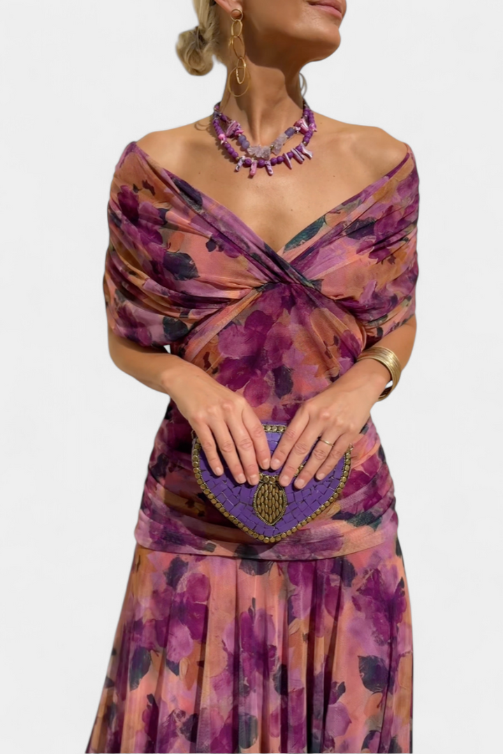 Comfortable yet stylish women's floral maxi dress, V-neck, pleated waist, and elegant flowing skirt.