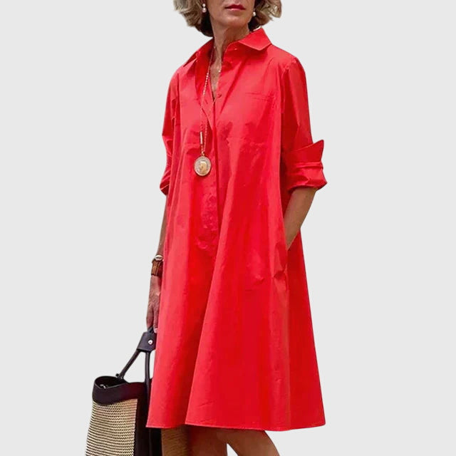 Close-up: Convenient deep pockets on an elegant flowy women's dress. Comfortable & practical summer fashion.