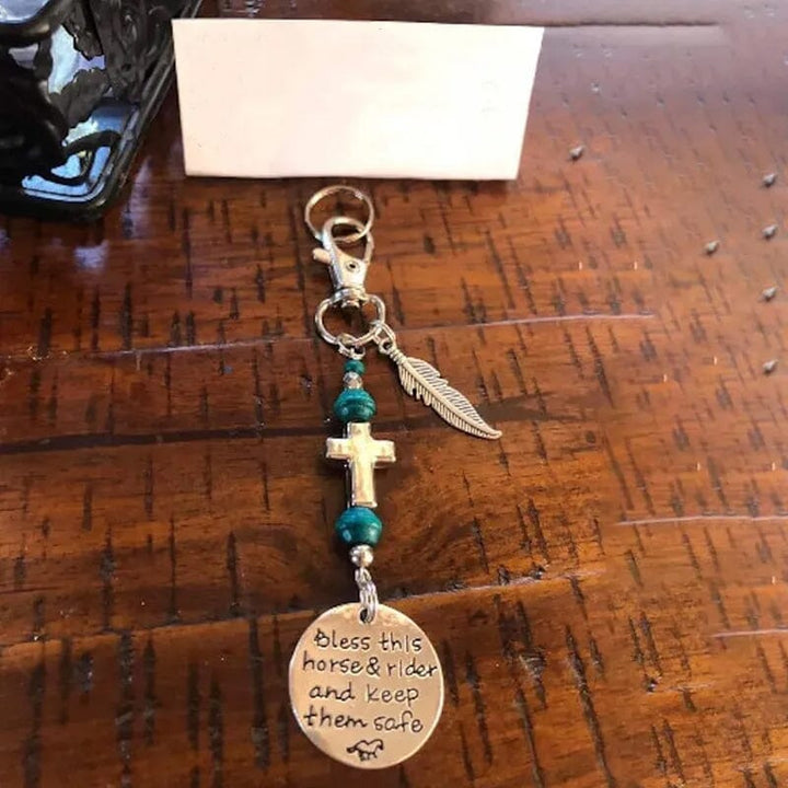 Hand-held horse saddle & bridle charm clip, showing its detailed craftsmanship