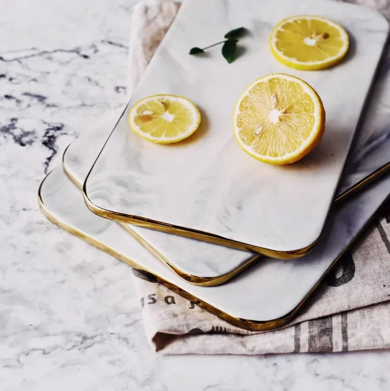 Elegant marble cutting board with polished finish, ideal for gourmet cooking and kitchen elegance, rectangular 10x16 inches.
