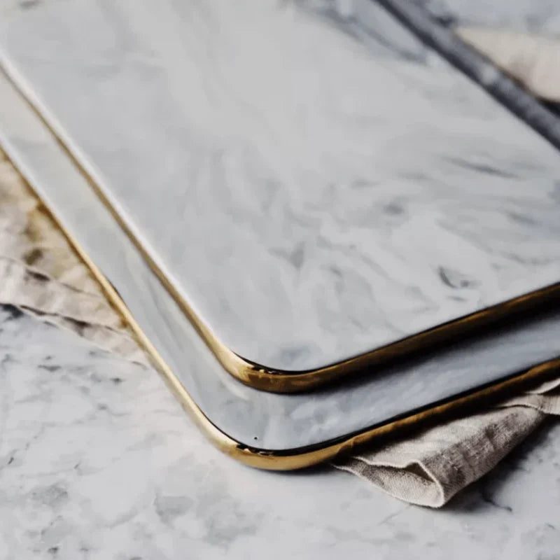 Elegant marble cutting board with polished finish, ideal for gourmet cooking and kitchen elegance, rectangular 10x16 inches.