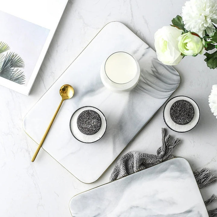 Elegant marble cutting board with polished finish, ideal for gourmet cooking and kitchen elegance, rectangular 10x16 inches.