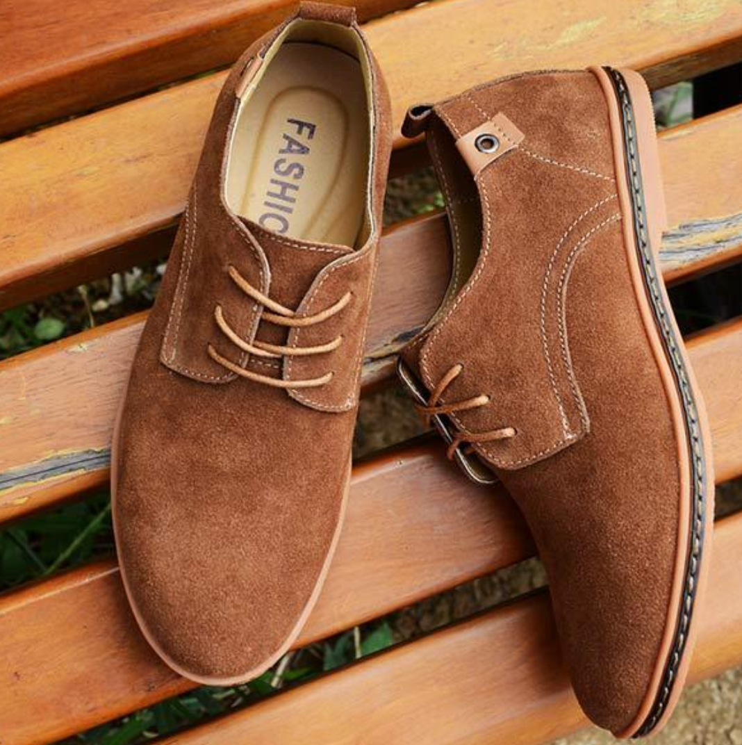 Classic men's lace-up Derby shoes, offering a timeless and elegant choice for any refined outfit.