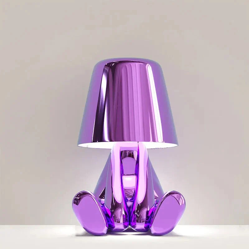 Elegant metallic thinker design table lamp with energy-efficient LED, featuring a unique thinker sculpture for modern decor.