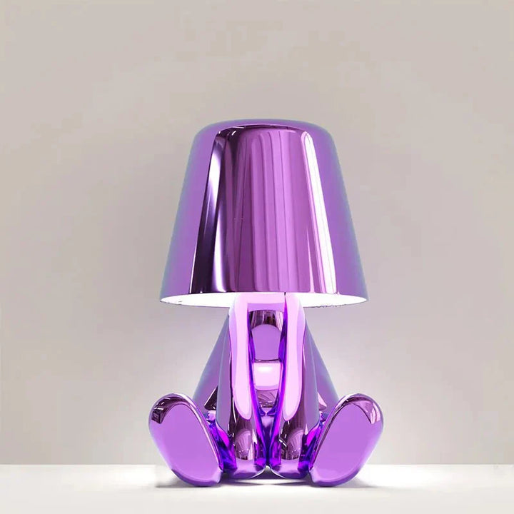 Elegant metallic thinker design table lamp with energy-efficient LED, featuring a unique thinker sculpture for modern decor.