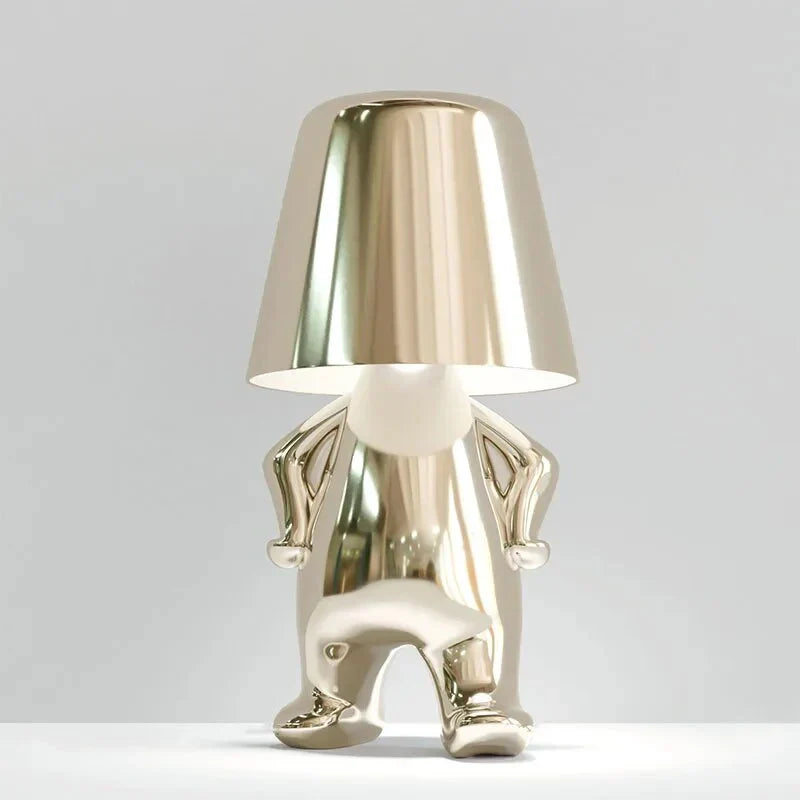 Elegant metallic thinker design table lamp with energy-efficient LED, featuring a unique thinker sculpture for modern decor.