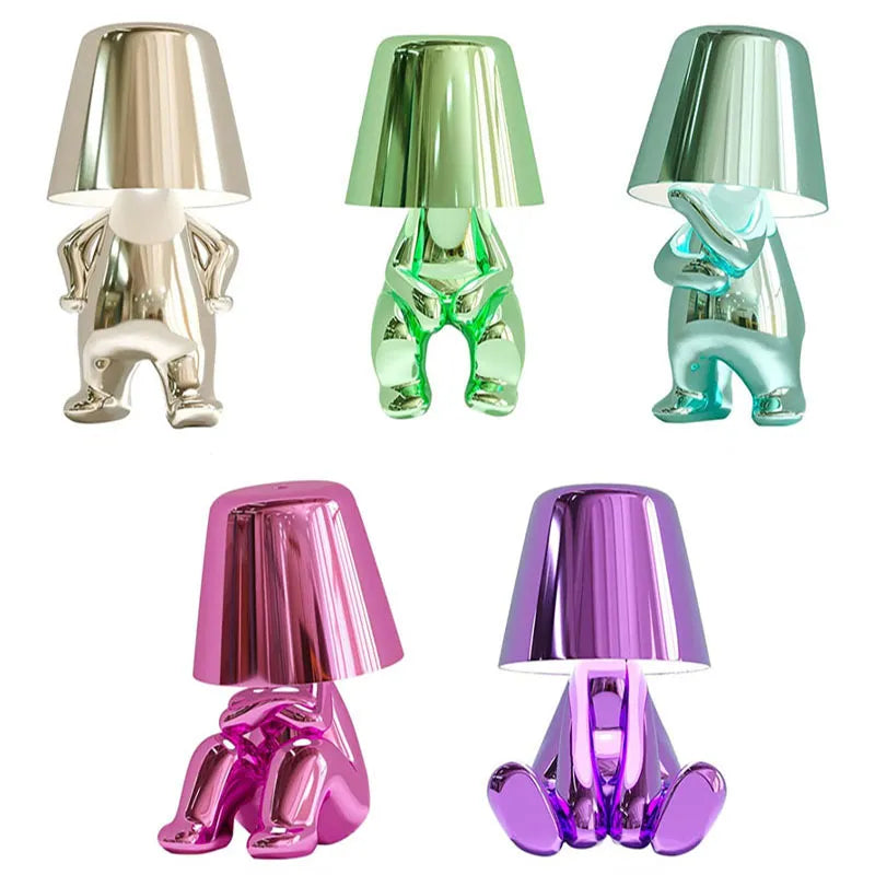 Elegant metallic thinker design table lamp with energy-efficient LED, featuring a unique thinker sculpture for modern decor.