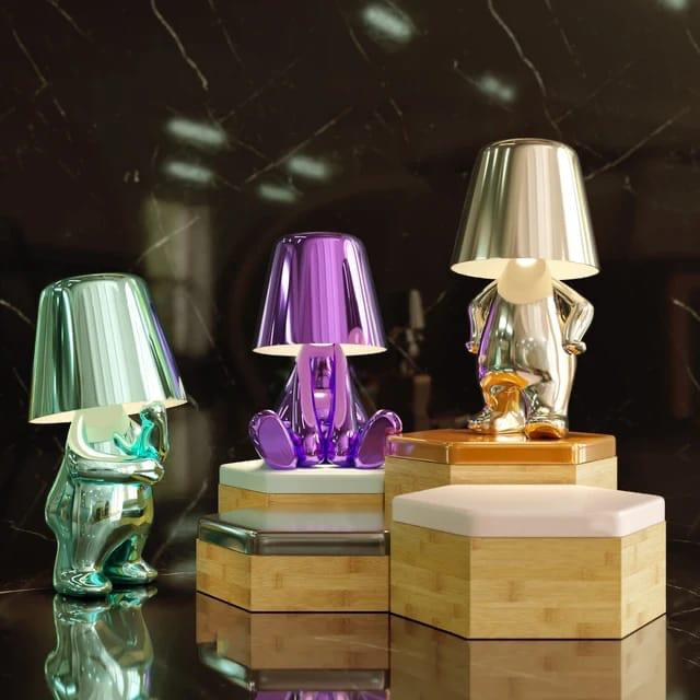 Elegant metallic thinker design table lamp with energy-efficient LED, featuring a unique thinker sculpture for modern decor.