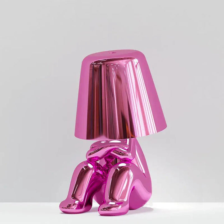 Elegant metallic thinker design table lamp with energy-efficient LED, featuring a unique thinker sculpture for modern decor.
