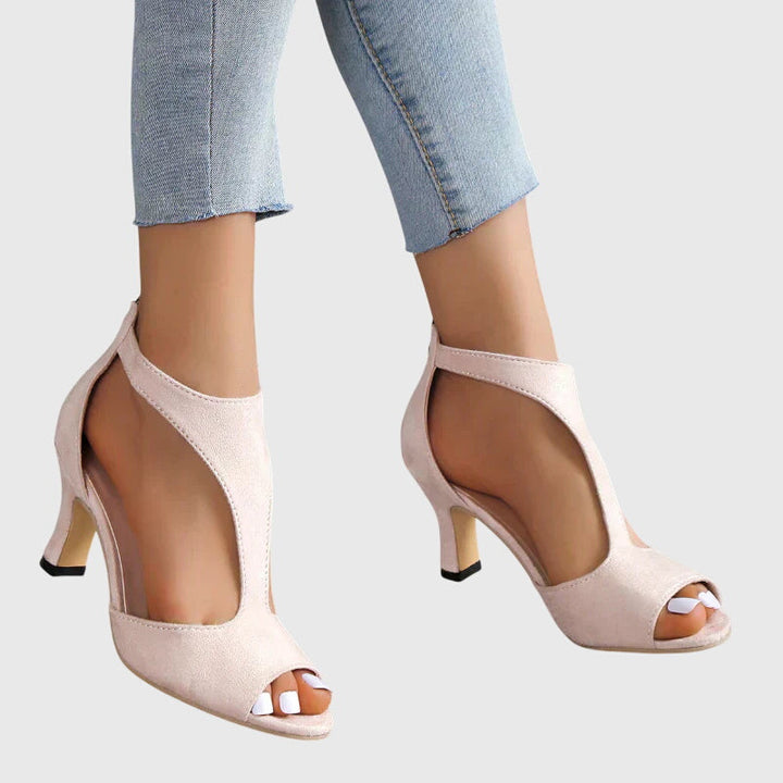 Stylish black cutout strappy stiletto heels for women, ideal as fashion party shoes