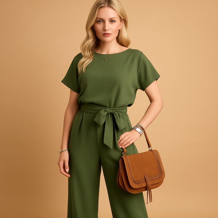 Sophisticated women's tailored jumpsuit with graceful flowy sleeves, ideal for evening wear.