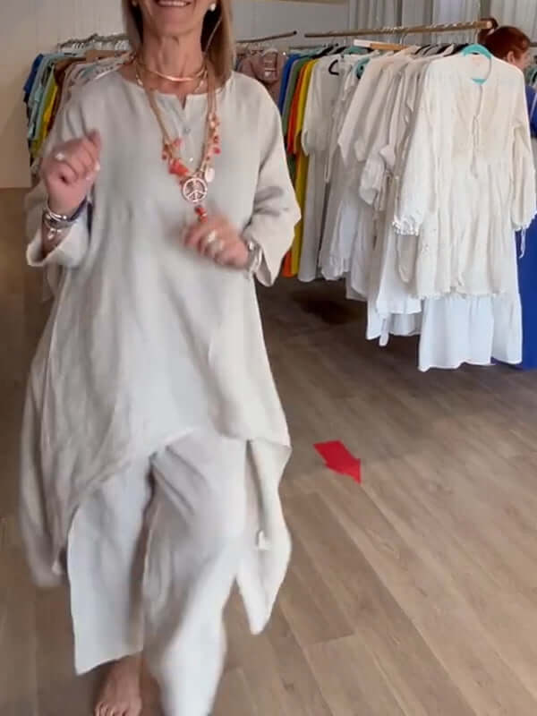 Contemporary women's summer two-piece suit, stylish relaxed fit for modern warm weather fashion.