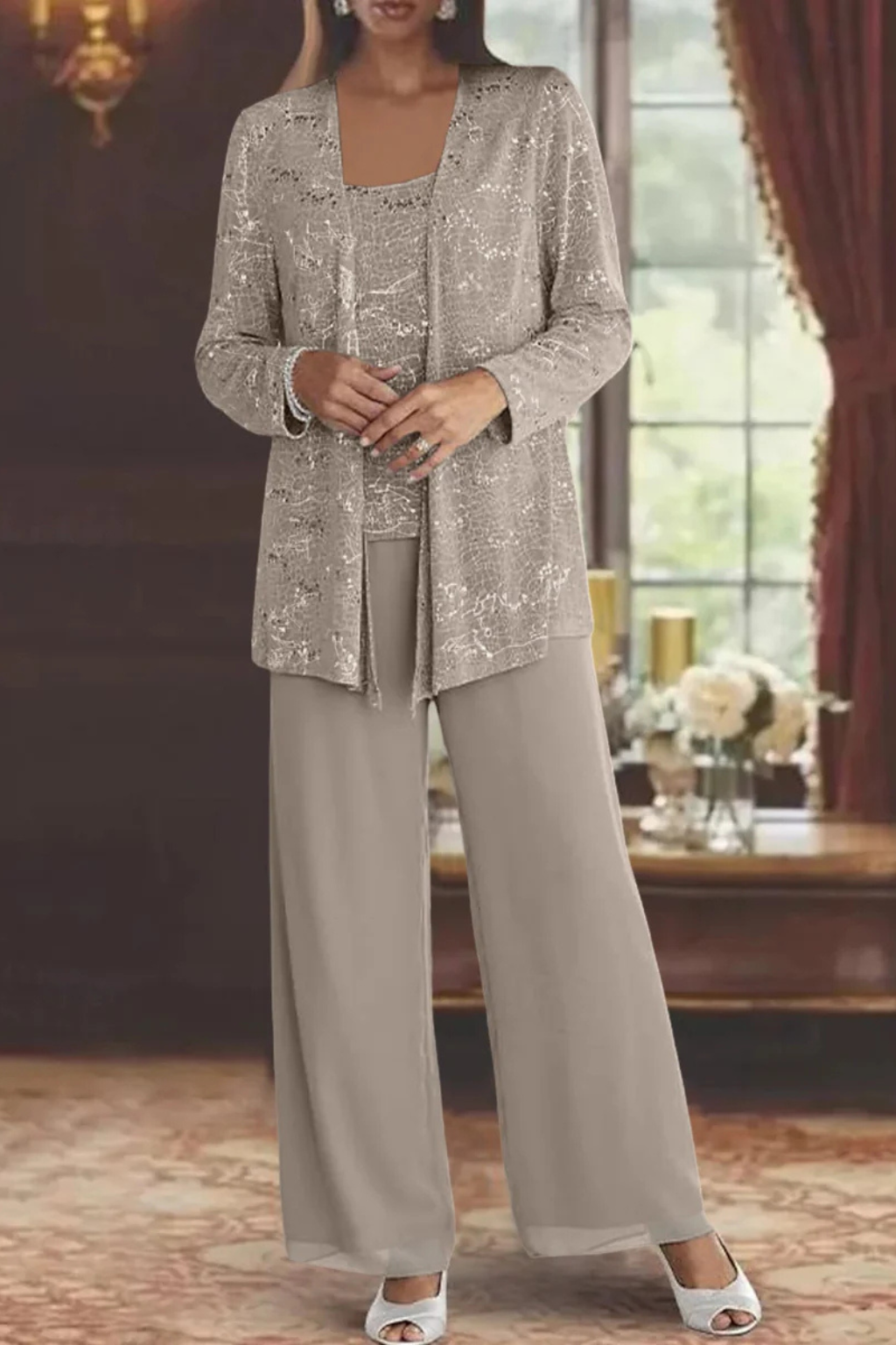 Women's glamorous sequin wide leg pant suit set in motion, perfect for an evening out.