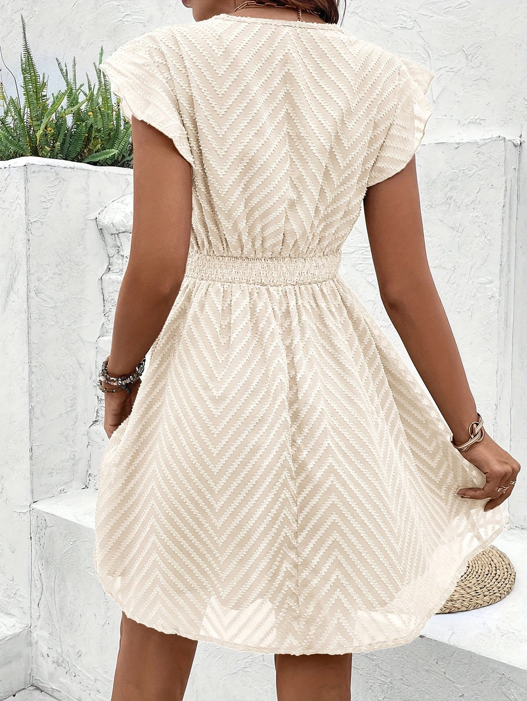 Chic women's apricot summer party dress, featuring a flattering sweetheart neckline & elegant flared design.