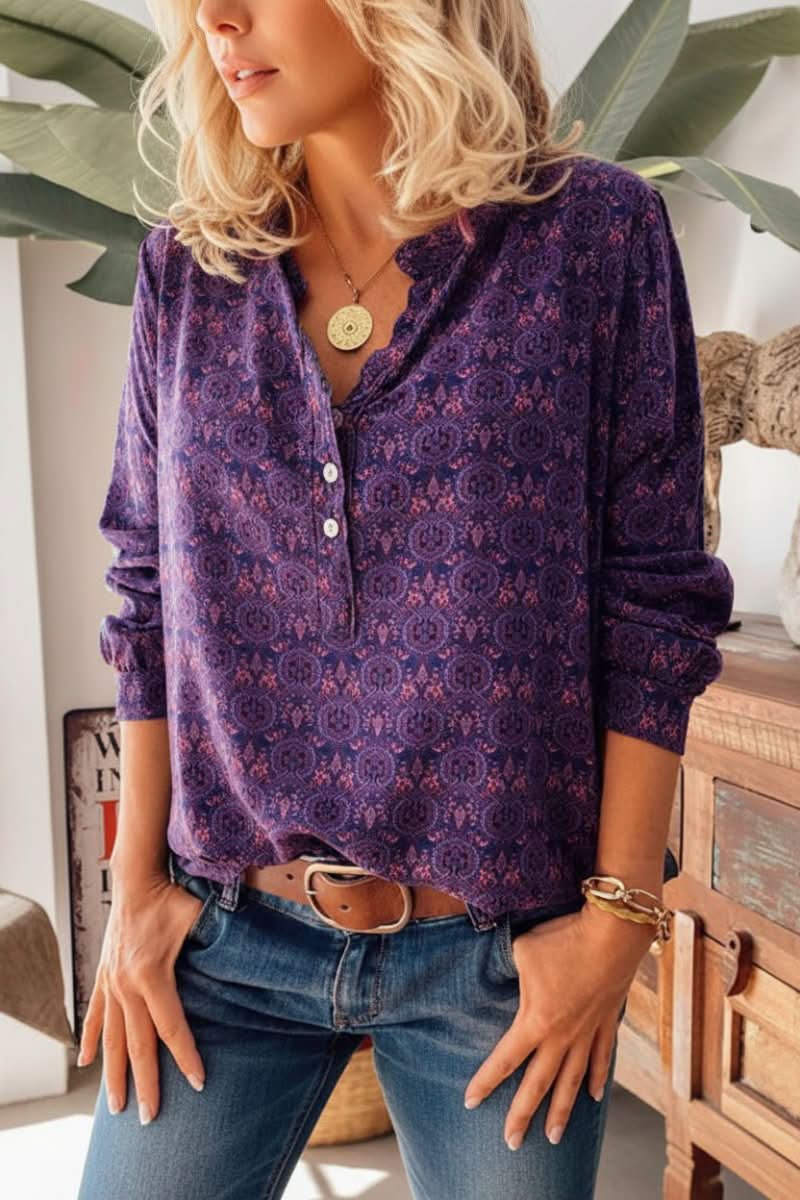Artistic vintage print long sleeve women's top with a relaxed fit and button-front closure. Chic and versatile.