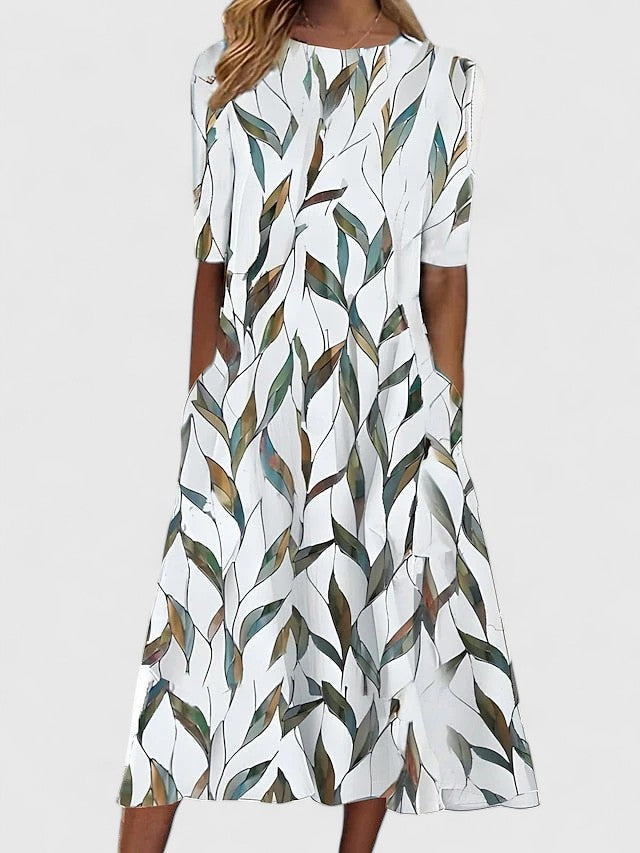Versatile women's midi dress with a chic boat neck, flattering fit and flare silhouette, perfect for casual & occasion wear.