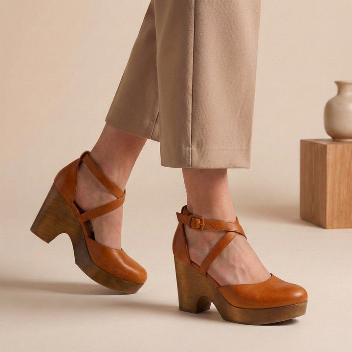 Stylish & comfortable women's block heel pumps, closed-toe with an ankle strap for elegant formal wear.