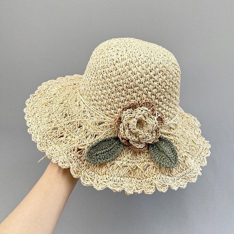 Women's summer hat, a refined crochet straw design with an elegant and charming ruffle.