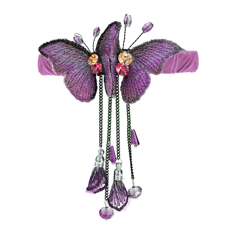 Sophisticated women's butterfly hair clip, embroidered design with fringe, versatile for any occasion.
