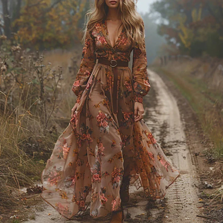 Detailed view of the fabric and elegant embroidery on a women's long sleeve boho maxi dress.
