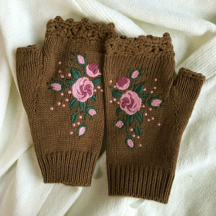 Black acrylic women's embroidered gloves, versatile accessory for various winter jackets and coats.