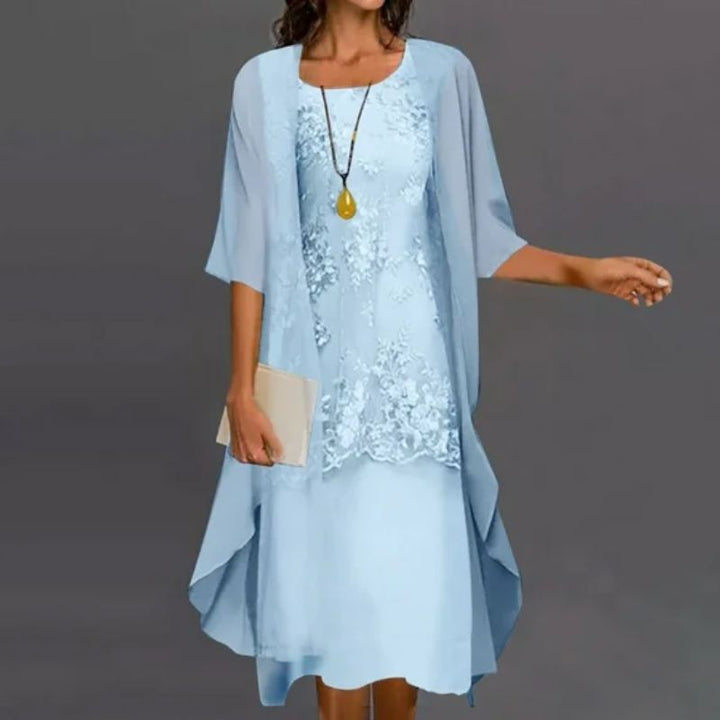 Stylish women's floral lace midi dress & sheer cardigan set for sophisticated occasion wear. Perfect for formal events.