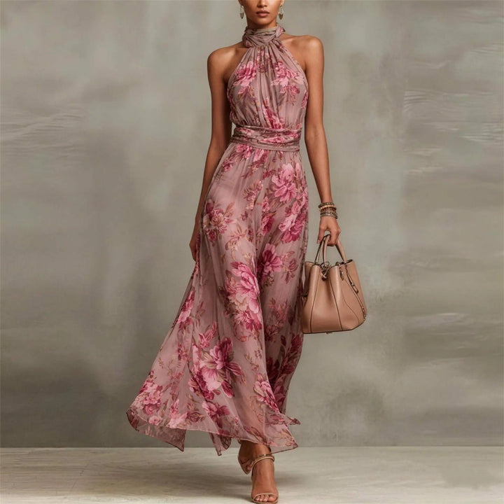 Elegant women's floral maxi dress with a halter neckline and ruched waist, perfect for wedding guests.