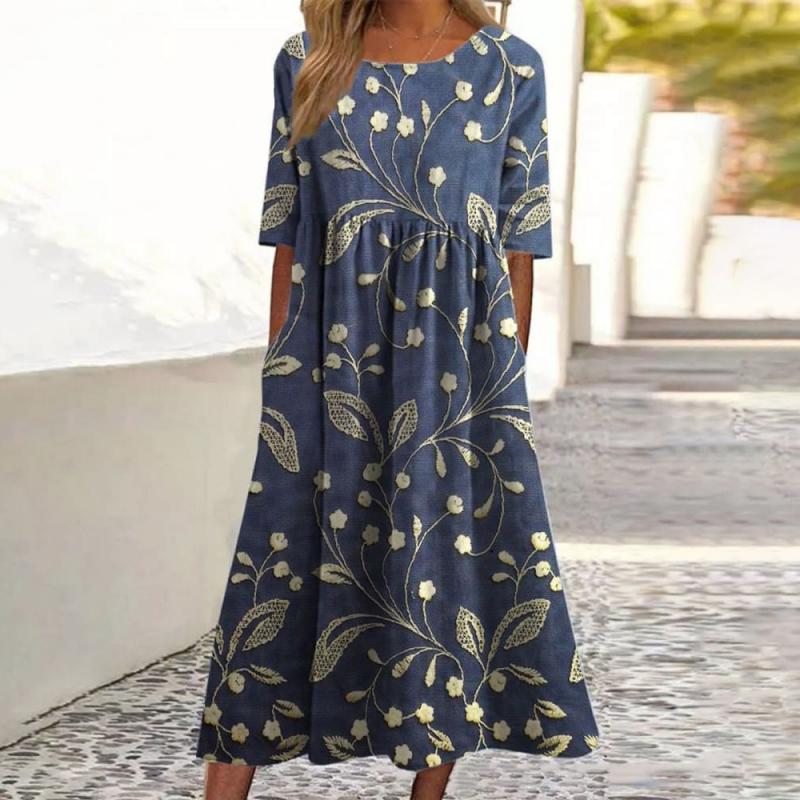 Versatile women's midi dress featuring a beautiful floral print, ideal for elegant spring fashion or summer events.