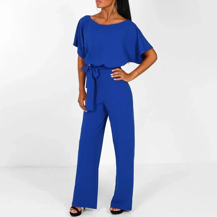 Stylish women's belted jumpsuit in a chic design, accentuating a slim waist for formal wear.