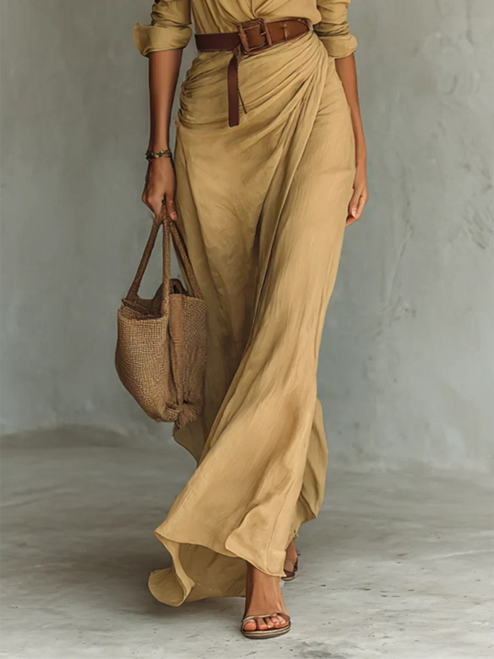 Sophisticated long sleeve maxi dress for women, featuring a flattering wrap style and belt. Great for cooler weather.