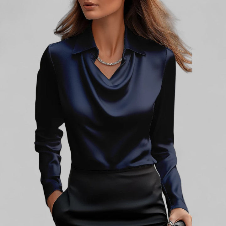 Stylish women's fashion top featuring a soft draped neck and long sleeves, great for a polished look.