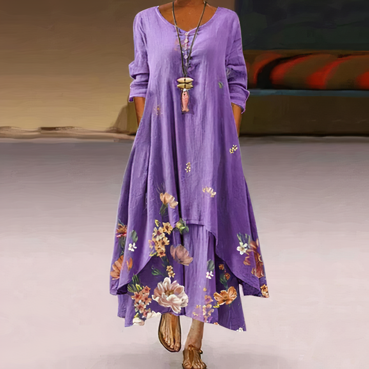 Women's flowy printed long-sleeve midi dress with an elegant asymmetric hem.
