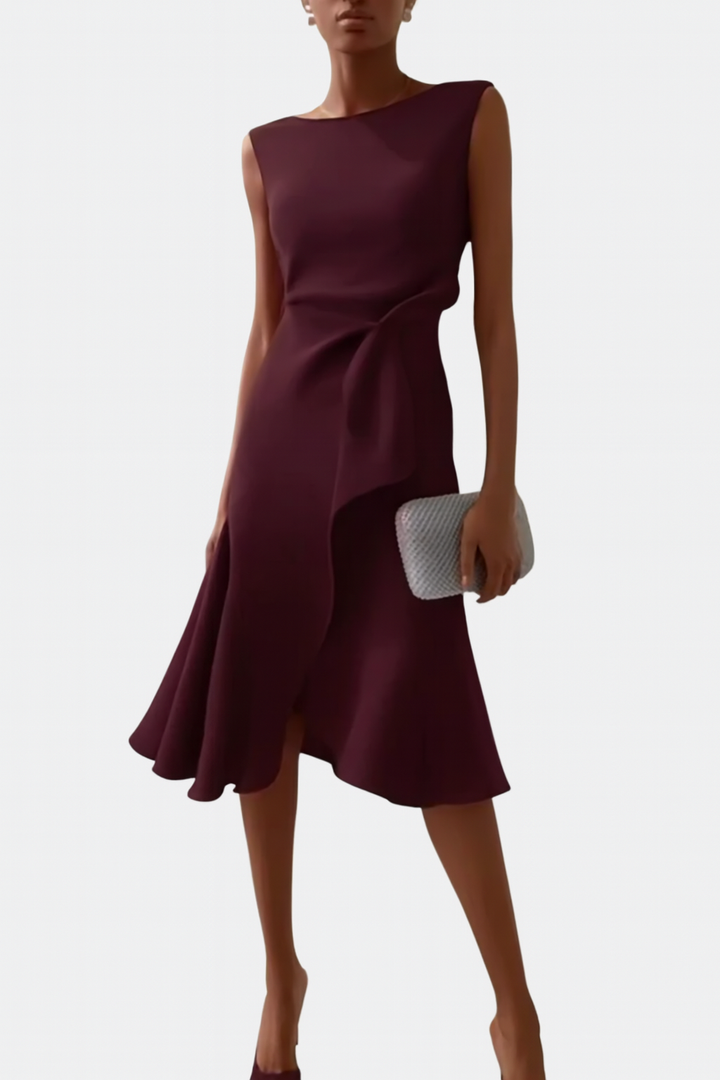 Women's sleeveless midi dress with a round neck, ruffle hem, and elegant wrap detail for parties.